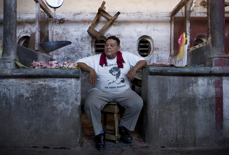 Butcher at the Granada's meat market.